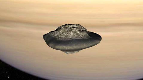 Компьютерное изображение Атласа на фоне Сатурна
